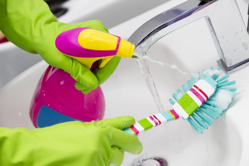 Professional mattress cleaning equipment in use