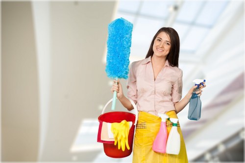 Business cleaning team maintaining a polished office environment