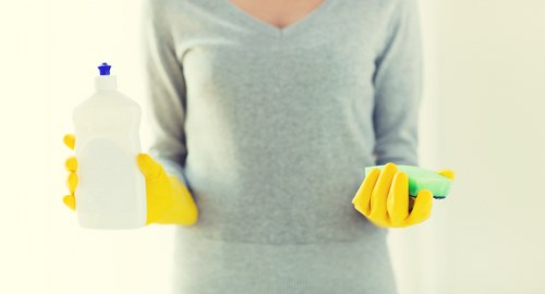Janitorial staff performing commercial cleaning in a retail facility