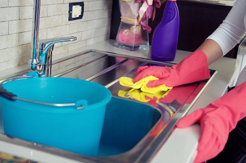 Professional oven cleaning of greasy oven interior